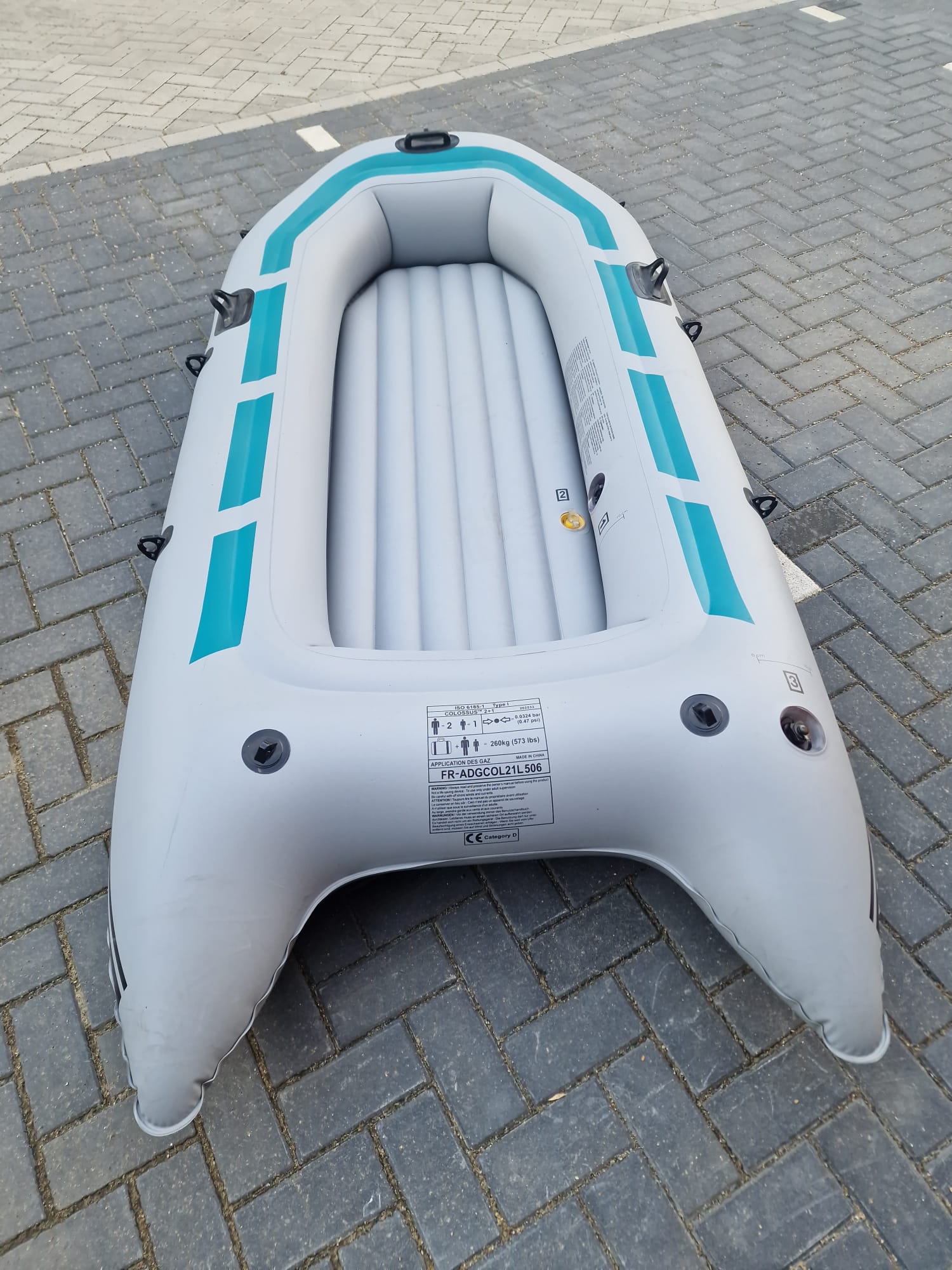 Grijs-turquoise opblaasboot Colossus met luchtbodem